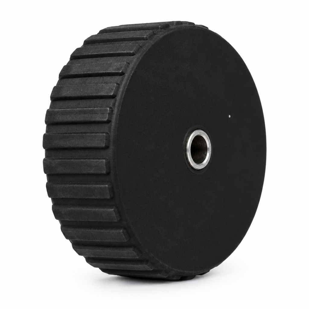Wheel 52 black solid face with metal-lined hub opening and horizontal ridges on outer tyre